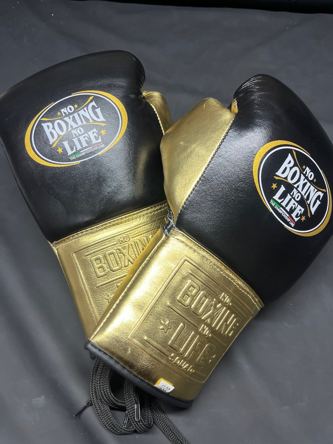 No Boxing No Life black and gold lace-up boxing gloves front view