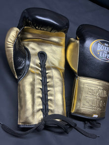 No Boxing No Life black and gold lace-up boxing gloves detail view