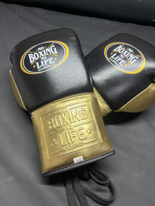 No Boxing No Life black and gold lace-up boxing gloves angled view