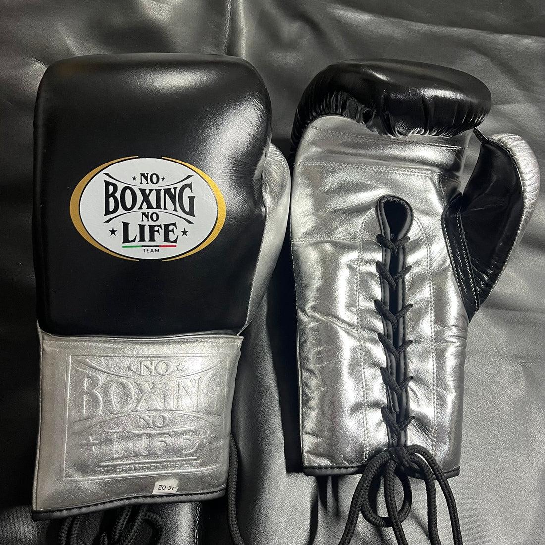 No Boxing No Life black and metallic silver lace-up boxing gloves front and back view