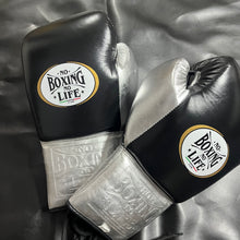 No Boxing No Life black and metallic silver lace-up boxing gloves angled view
