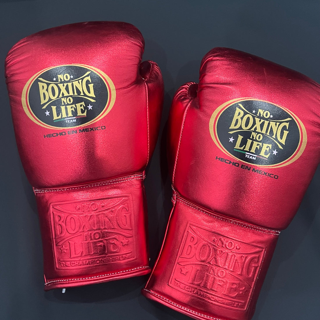 No Boxing No Life red lace-up boxing gloves front and cuff view