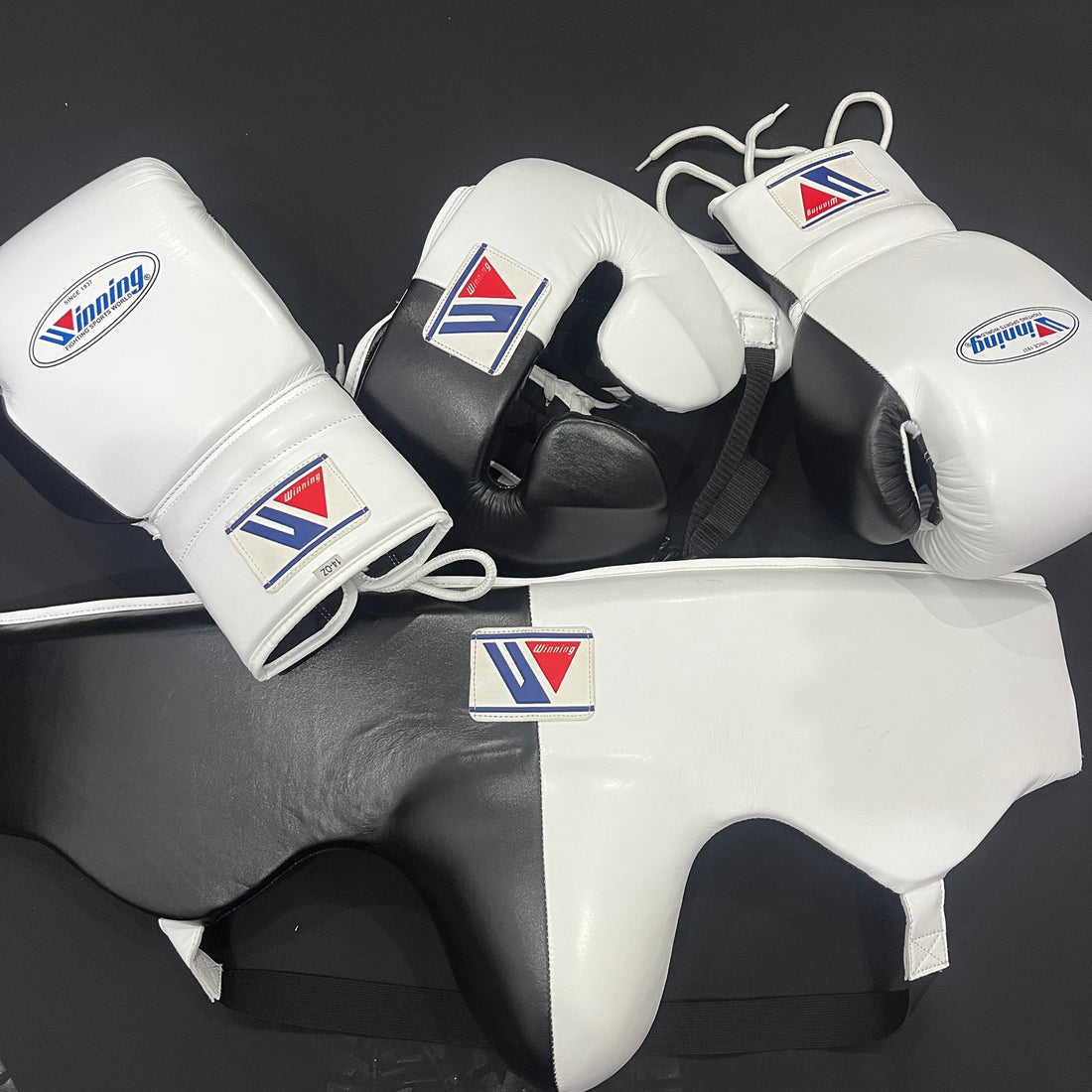 Black and white Winning boxing set with gloves, headguard and groin guard