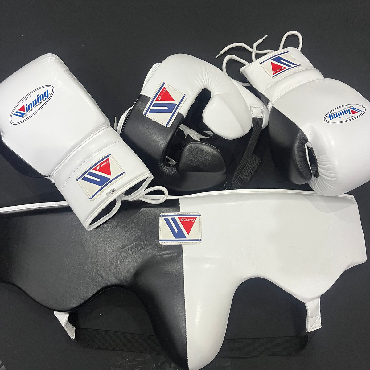 Black and white Winning boxing set with gloves, headguard and groin guard