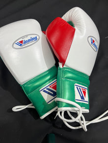 Winning white green and red lace-up boxing gloves side detail view